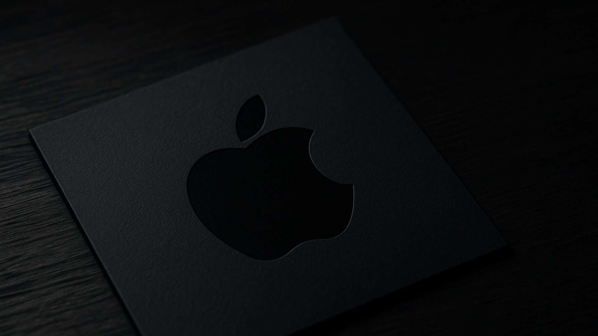Logo noir minimaliste sur support premium, illustrant le noir comme signature d'identité visuelle